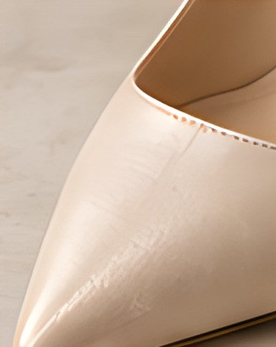 Close-up of the pointed toe of the DIID champagne slingback heel