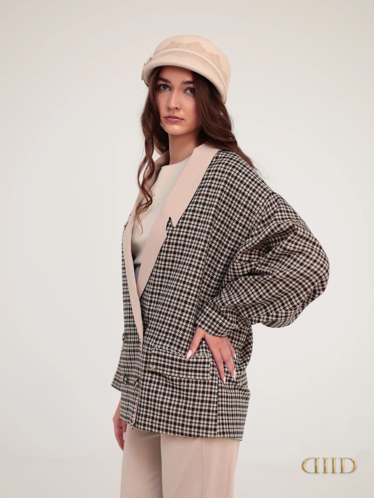 Side view of the relaxed houndstooth blazer