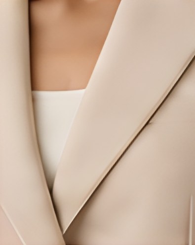 Close-up of the notch lapel on the DIID ivory tailored blazer
