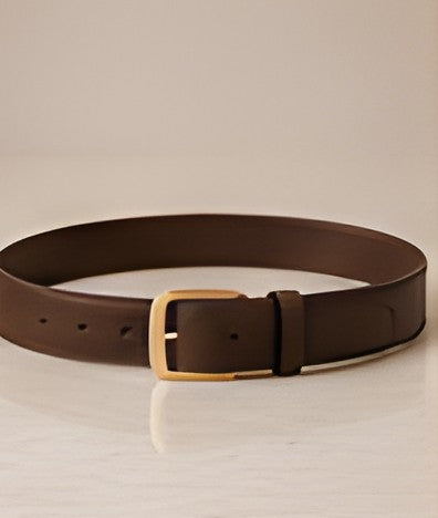 The chocolate Signature Leather Belt laid flat to show its full length