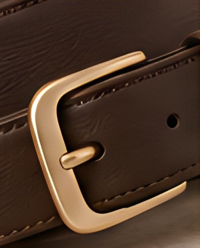 Close-up of the gold-tone buckle and stitched edge of the DIID leather belt