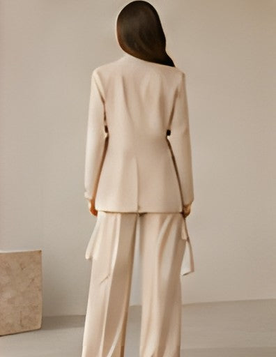 Back view of the beige DIID tailored blazer and wide-leg trousers